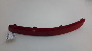 Front bumper trim strip - 527130D010