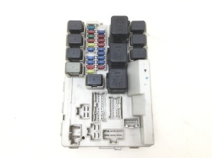 Fuse box housing under the hood
