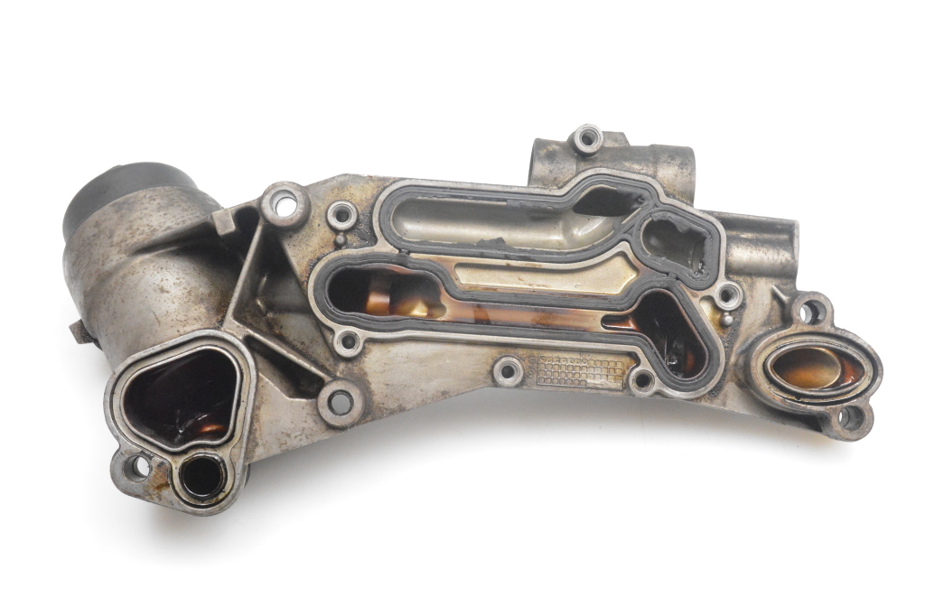 Used Opel Astra Oil filter housing 12992593