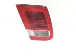 Trunk lid tail light and its parts - 
