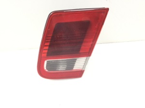 Trunk lid tail light and its parts - 