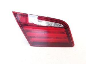 Tail light on trunk lid - 7203225