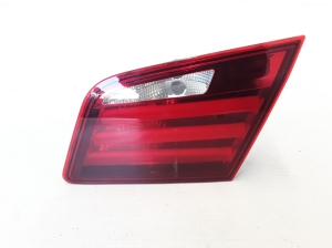 Tail light on trunk lid - 7203226