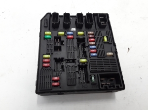  Fuse block holder under the hood 