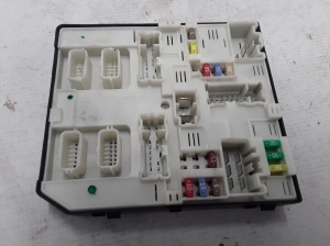  Fuse block holder under the hood 