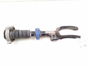 Front shock absorber and its components