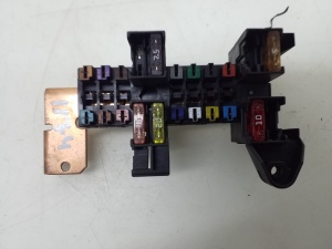   Fuse block holder under the hood 