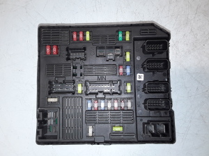  Fuse block holder under the hood 