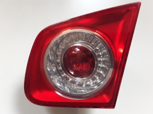 Tail light on trunk lid - 1K5945094