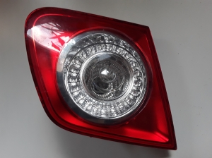 Tail light on trunk lid - 1K5945093