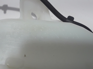  Windscreen washer tank front 