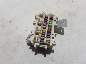  Fuse block holder under the hood 