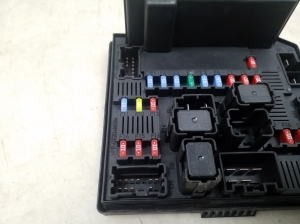  Fuse block holder under the hood 