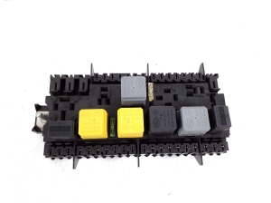   Fuse block holder under the hood 