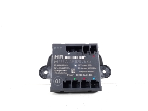   Rear side door control unit 