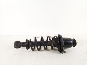 Rear shock absorber and its parts