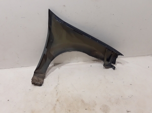 Dacia Logan I (2004–2012) Front fender 631019276R - 2