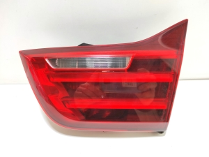 Tail light on trunk lid - 7296102