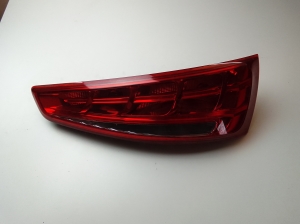 Trunk lid tail light and its parts - 