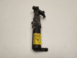   Headlamp spray nozzle 