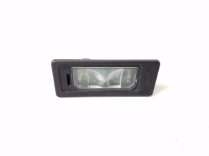   License plate lights  - GX7313B627AA 