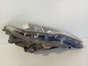 Opel Astra J (2009–2017) Headlight 13281283 - 2