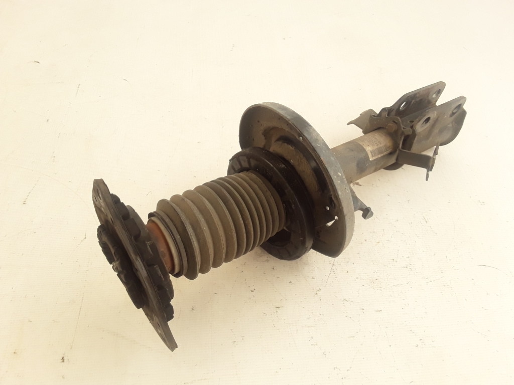 Used RENAULT Fluence Front shock absorber 543023532R