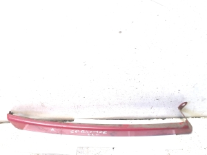 Molding under the headlight