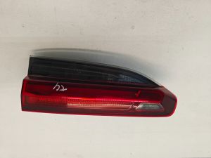 Tail light on trunk lid - 7743379711
